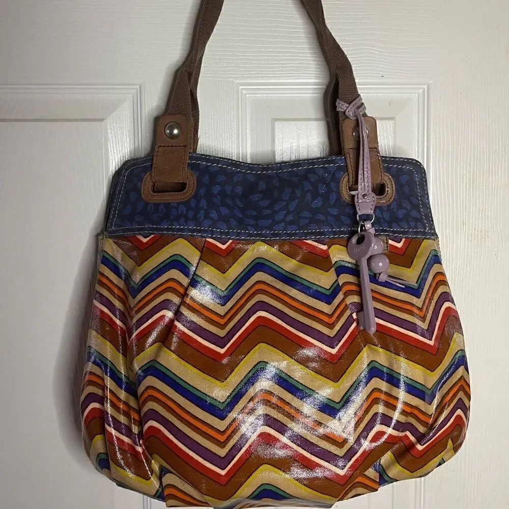 Fossil key Per multi color zigzag coated canvas ltote with blue & brown …
